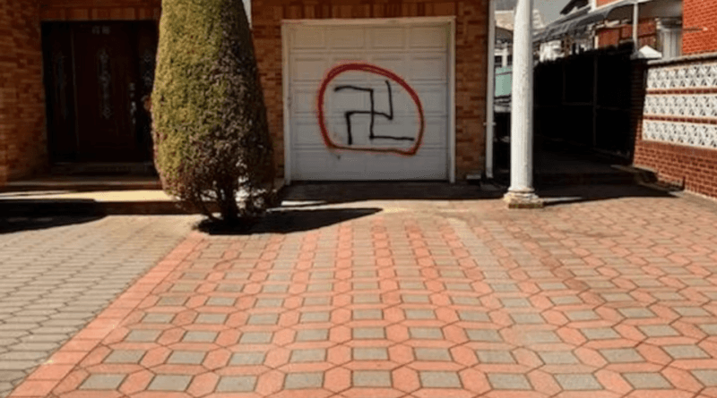 In New York, swastikas and other anti-Semitic graffiti painted on houses and synagogues